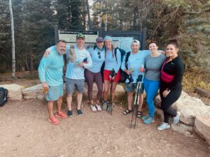 Tucson Board-Certified female Plastic Surgeon, Dr. Jamie Moenster and Board-Certified Dermatologist, Dr. Christopher Weyer, standing with their travel buddies during their rim-to-rim Grand Canyon hike.